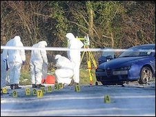 CSI officers examine the scene around Peadar Heffron's Alfa Romeo car
