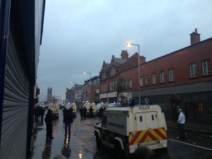 Police in riot gear move into east Belfast on Saturday evening