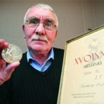 Boxer John McNally with th safe return of his silver Olympic medal