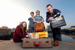 LIGHT, CAMERA, CTION, Colin Todd of Brennans Bread (right) with actors Susan Davey and Ruby Campbell and schoolgirl Jessica Potter. 