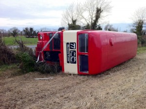 The overturned double decker bus on Saturday which was carrying around 62 wedding guests