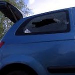 Car hit with bullets as gunman opens fire on police in west Belfast