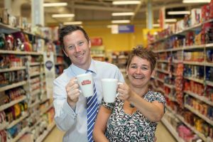 COFFEE BREAK... Maria Losty from Robert Roberts joins Steven Murphy, Buying Manager of Tesco Northern Ireland, as the local tea and coffee company secured a deal to supply its new Dark Roast Shipyard Strength coffee to the retail giant. 