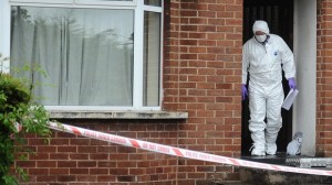 Forensic officers at the scene of a fatal stabbing in Dungannon on Thursday