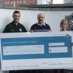 Crime Team cheque presentation Constable Daryl Watton (left), PSNI Crime Team, presenting a cheque for £1,410 to Dessie Kyle, HURT centre manager, and Pauline McCloskey, HURT finance manager.