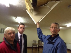 Alderman Maurice Devenney, Councillor Gary Middleton and Grand Master James Hetherington inspect damage to Fawney Orange Hall