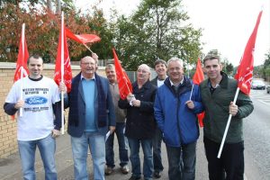 Former Visteon workers hold white line protest at former Belfast factory on Saturday