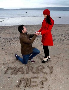 MAGIC QUESTION... Model couple Michael McCann and Anna Henry enjoy an engagement on the beach as the Northern Ireland Tourist Board (NITB) is spreading the message of love by highlighting some of the most romantic hotspots and stunning locations to woo that special person in your life.
