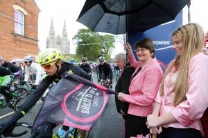 Pictured starting the third stage of the race, the Minister cheered the cyclists as they began their journey to Dublin.   Picture by Kelvin Boyes / Press Eye.