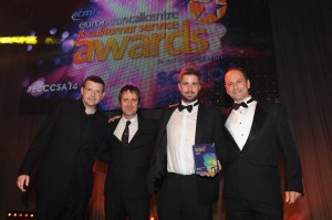 Comedian Kevin Bridges, Ash Schofield from giffgaff, Richard Elwell from Firstsource Solutions and Presenter award Firstsource ‘Outsourcing Partnership of the Year’ with giffgaff at the European Call Centre and Customer Service awards.