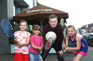 PIZZA THE ACTION… Luke Wolsey, Managing Director of Little Wing Pizzeria, joins Meghan Cahill (7), Chole Cahill (6) and Caoimhe McDonnell (9) as Little Wing launches its Little Sports Star bursary programme