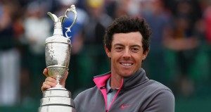 Rory McIlroy proudly holds the Open Championship Claret Jug