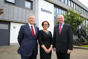 First Minister Peter Robinson and deputy First Minister Martin McGuinness are pictured with Consulting Partner, Deloitte Jackie Henry.. PIC: KELVIN BOYES/PRESSEYE