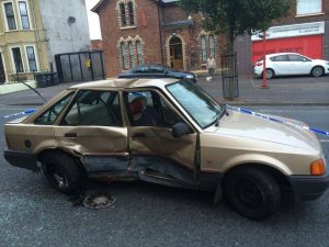 The stolen Ford Escort car which crashed in Woodvale, west Belfast