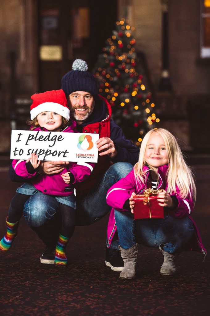 MAKE A PLEDGE… Leukaemia survivor Tony Miskelly from Bangor joins his daughters Freyja (6) and Emme (2) to ask people to support Northern Ireland’s only blood cancer research charity Leukaemia & Lymphoma NI as it marks the end of its 50th anniversary year.