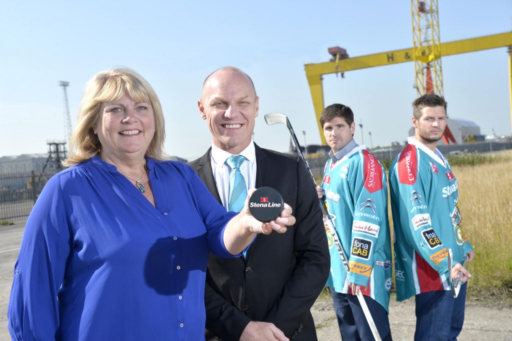 Diane Poole, Head of PR and Communications at Stena Line and Steve Thornton, Head of Hockey Operations at the Stena Line Belfast Giants celebrate with players Adam Keefe and Brandon Benedict after securing their biggest re-signing of the season as the leading ferry company announced that it will once again become the ice hockey teams title sponsor in 2015/2016, for the fifth successive year. 