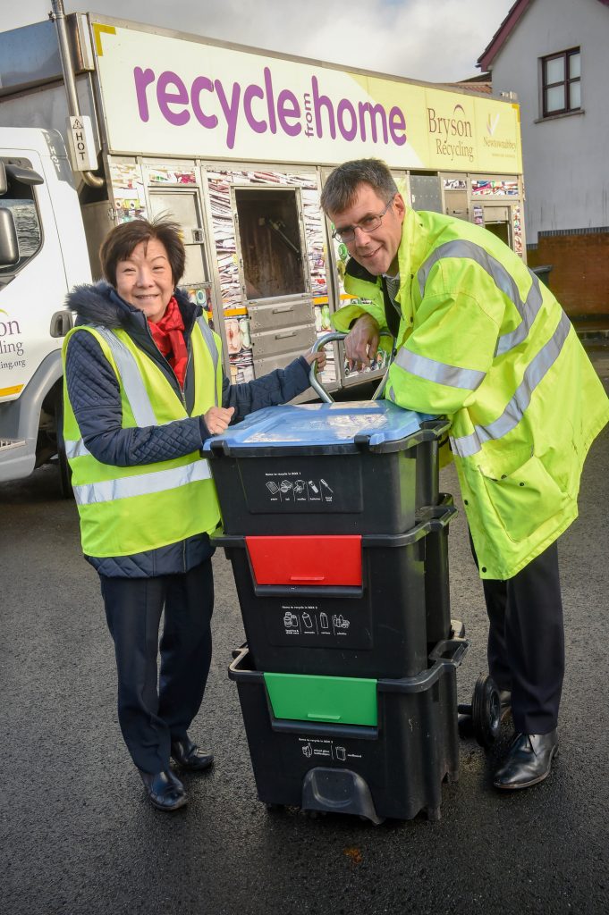South Belfast MLA Anna Lo and Chair of the Environment Committee meets with Bryson Recycling Director Eric Randall to try out the innovative ‘Wheelie Box’, which could save local councils an estimated £4m each year.