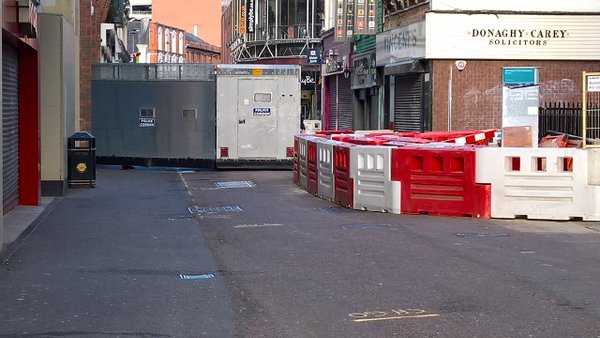 A security barrier erected in Belfast city centre this morning ahead of republican and loyalist parades