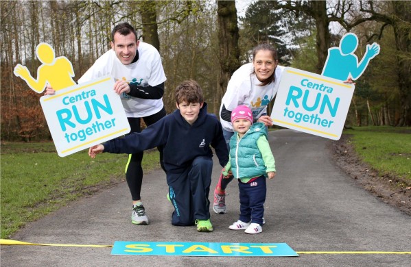 KEEP IT IN THE FAMILY: World Masters 800m champion Kelly Neely, from Lisburn, gets a little help from husband Ian, 18 month daughter Sarah and 13 year old Oliver Gilmore from Saintfield to launch a new series of fun runs across Northern Ireland. Centra Run Together is a set of four 5k races taking place across Belfast, Mid Ulster and Derry. Photographer Darren Kidd / Press Eye