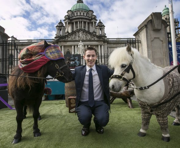 ‘Neigh’ Worries as Commuters Cheered Up by Scottish Ponies: L’Derry man Kevin Bradley checks out the ‘mane’ attraction at Belfast City Hall as Shetland ponies in pyjamas brought cheer to the dreaded Monday commute. Research from VisitScotland revealed three quarters of Northern Ireland Irish workers are impacted by ‘Sunday Night Fear,’ with the organisation calling for more weekend adventures. Picture by Brian Morrison