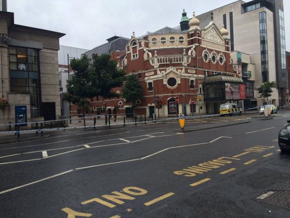 The scene in Great Victoria Street where area is cordoned by police at Grand Opera House
