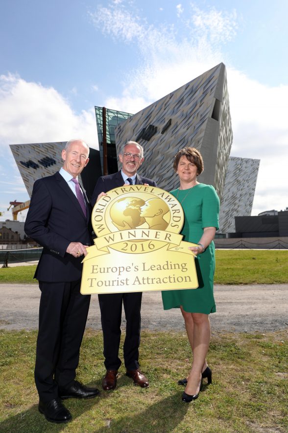 First Minister Arlene Foster joins celebrations with Titanic Belfast’s Vice-Chairman Conal Harvey (left) and Chief Executive Tim Husbands MBE (centre), as it is named as Europe’s Leading Visitor Attraction at the prestigious World Travel Awards held in Sardinia, Italy, beating off stiff competition from The Eiffel Tower, France and The Roman Colosseum, Italy.