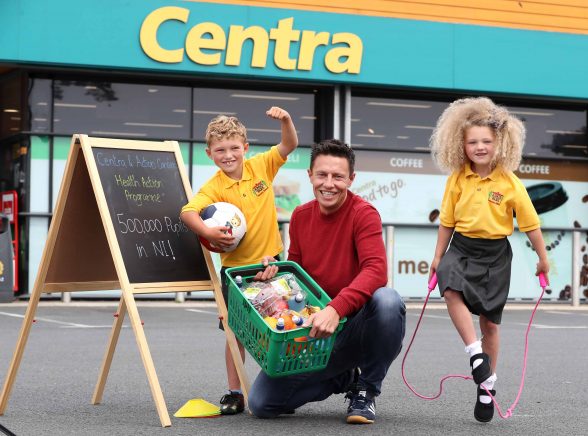 LOCAL personality, Stephen Clements of Q Radio's breakfast show, has been announced as Action Cancer's Health Action programme Ambassador. Pictured with Stephen are KingÕs Park Primary School, Newtownabbey, pupils Ross (7) and Heidi (6) Campbell. Picture by William Cherry / Press Eye