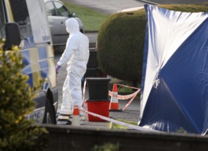 CSI officers comb the murder scene in Ballymena