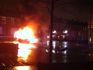 Car on fire in east Belfast during rioting