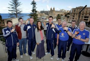 Northern Ireland manager Michael O'Neill, backroom staff and NIFWA Mark McIntosh raised a glass to MB