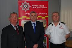 NIFRS chief executive Jim Wallace (centre) email staff of Terry McGonigal