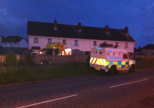 Police at the scene in Lurgan's Bell's Row Court