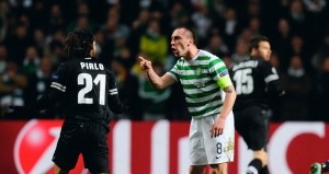 Celtic's Scott Brown in a verbal tussle with Juve's Pirlo