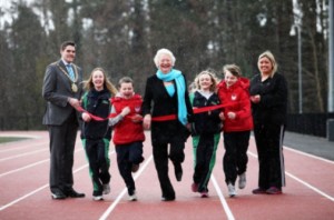 Dame Mary Peters (centre), Belfast Lord Mayor Gavin Robinson (left) and Cllr Deirdere Hargey (right) at revamp Mary Peters track