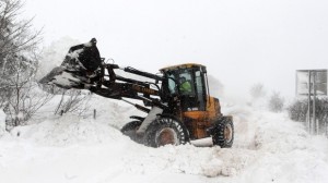 Councils used diggers to clear snow during severe weather conditions