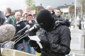 Real iRA masked terrorist reads out statement in Derry at Easter 