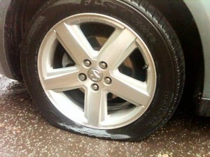 The slashed tyre on a car beloning to an Ulster rugby fan