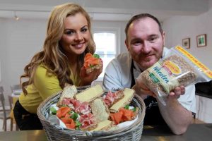 Local chef Niall McKenna and model Tiffany Brien help launch the Brennans Wheaten Brown Bread in Northern Ireland. 