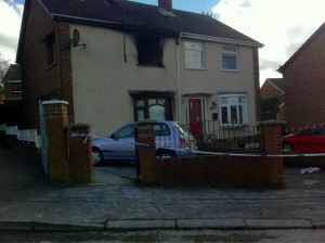 The scene of the blaze in Lenadoon Avenue in west Belfast on Thursday morning