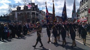 People line the streets of the Ravenhill Road in east Belfast for UVF parade