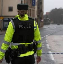 Police off a road in Fermanagh after a cyclist was killed following a collision with an ambulance