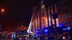 Fire crews tackle blaze at derelict bank premises in Belfast
