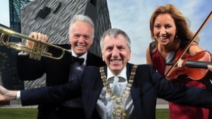 Noel Thompson, Belfast Lord Mayor Mairtin O'Muilleoir and Claire McCollum launch BBC Proms in the Park at Titanic Slipway