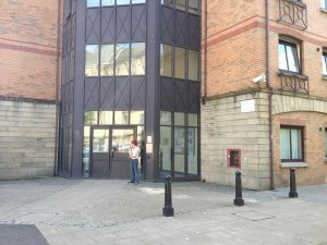 The social housing building in Donegall Street where a man was seen going in with a gun