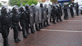 PSNI riot squad deployed to keep rival loyalists and republicans apart in north Belfast