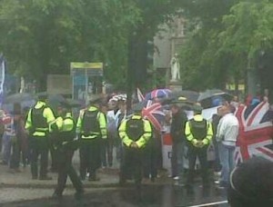 Police surround Union flag protestors at Belfast City Hall on Saturday
