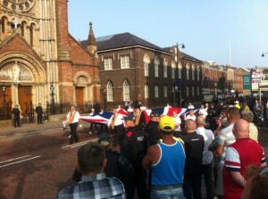 Orangemen and bands reach St Patrick's Church in Donegall Street on Friday evening