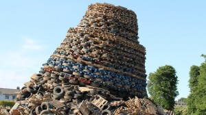 TIMBER...Massive bonfire collapses on the Ballycraigy estate