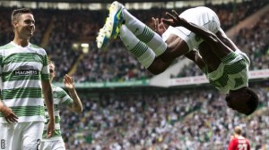 Jumping for joy... Efe Ambrose celebrates with a somersault after scoring Celtic's first goal
