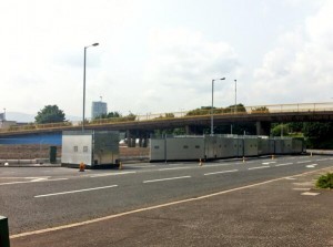 PSNI erect mobile screens at the bottom of the Newtownards Road in east Belfast on Friday evening